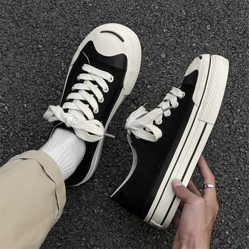 Férfi vászoncipő, alacsony felső rész, gumírozott talp, klinis sarok, sekély nyílás