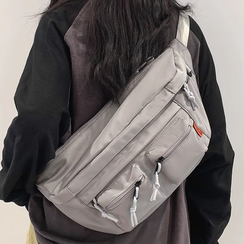 Muška crossbody torba — velika kapaciteta, funkcionalna za sport i vožnju biciklom; najlon, podstava poliester; unisex stil; proljeće 2025
