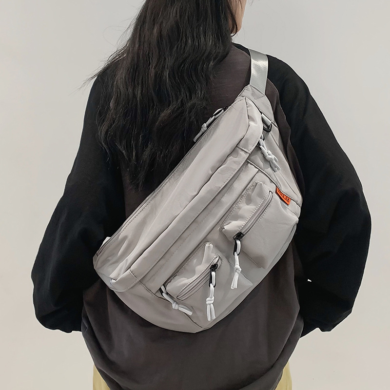Muška crossbody torba — velika kapaciteta, funkcionalna za sport i vožnju biciklom; najlon, podstava poliester; unisex stil; proljeće 2025