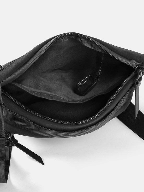 Unisex najlon crossbody torba sa zatvaračem, ovalni oblik, jednoručna naramenica, džep za telefon i dokumente.