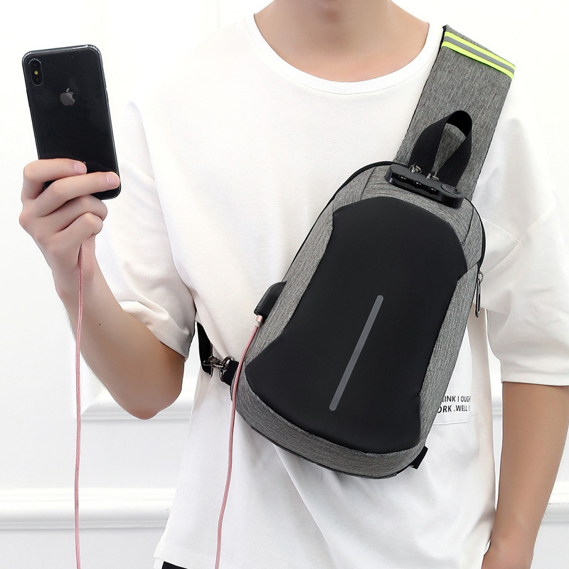Muška chest bag s protiv krađe, USB punjenjem, vodootporna, casual/poslovni stil; Materijal: Oxford platno; Zatvaranje: zip; Unutarnje: džep sa zipom i džep za laptop; Veličina: Srednja; Podstava: Najlon
