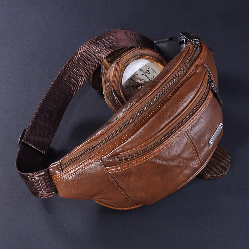 Férfi övtáska természetes bőrből, hold alakú, zipzárral záródó; belső rekeszek: zipzáras zseb, telefonzseb, identifikációs zseb, poliészter bélés