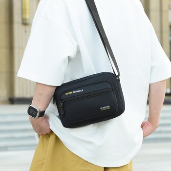 Muška crossbody torba, gradski minimalistički stil, Oxford tkanina, vodootporna, ultra lagana, proljeće 2025