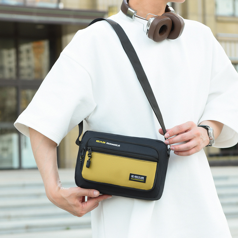 Muška crossbody torba, gradski minimalistički stil, Oxford tkanina, vodootporna, ultra lagana, proljeće 2025