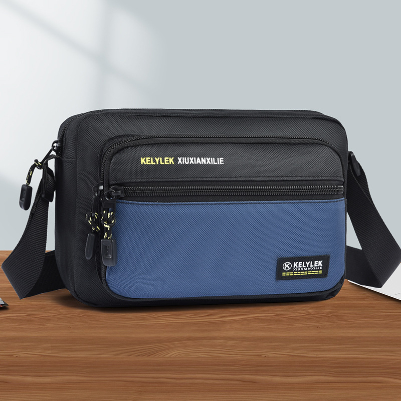 Muška crossbody torba, gradski minimalistički stil, Oxford tkanina, vodootporna, ultra lagana, proljeće 2025