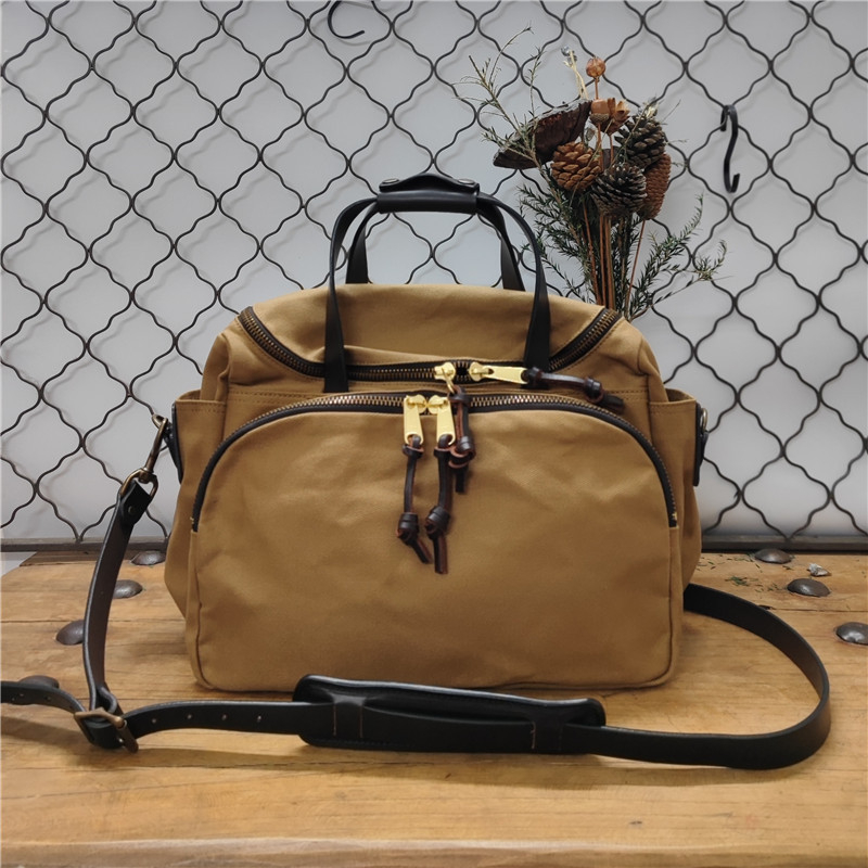 Geantă de umăr din pânză cerată și piele naturală, cu mai multe compartimente — geantă de voiaj unisex