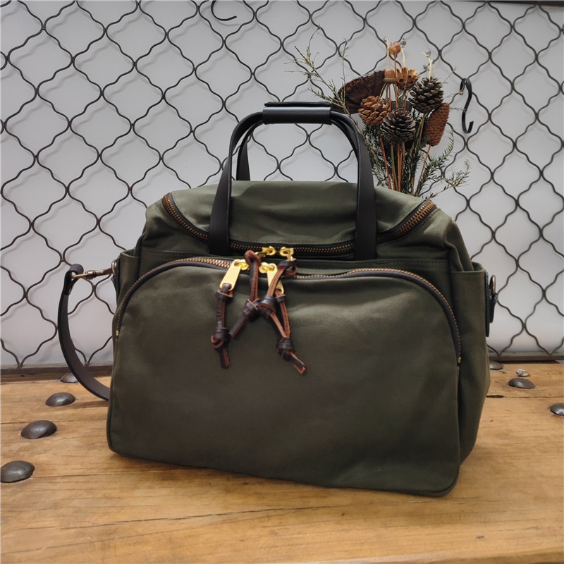 Geantă de umăr din pânză cerată și piele naturală, cu mai multe compartimente — geantă de voiaj unisex