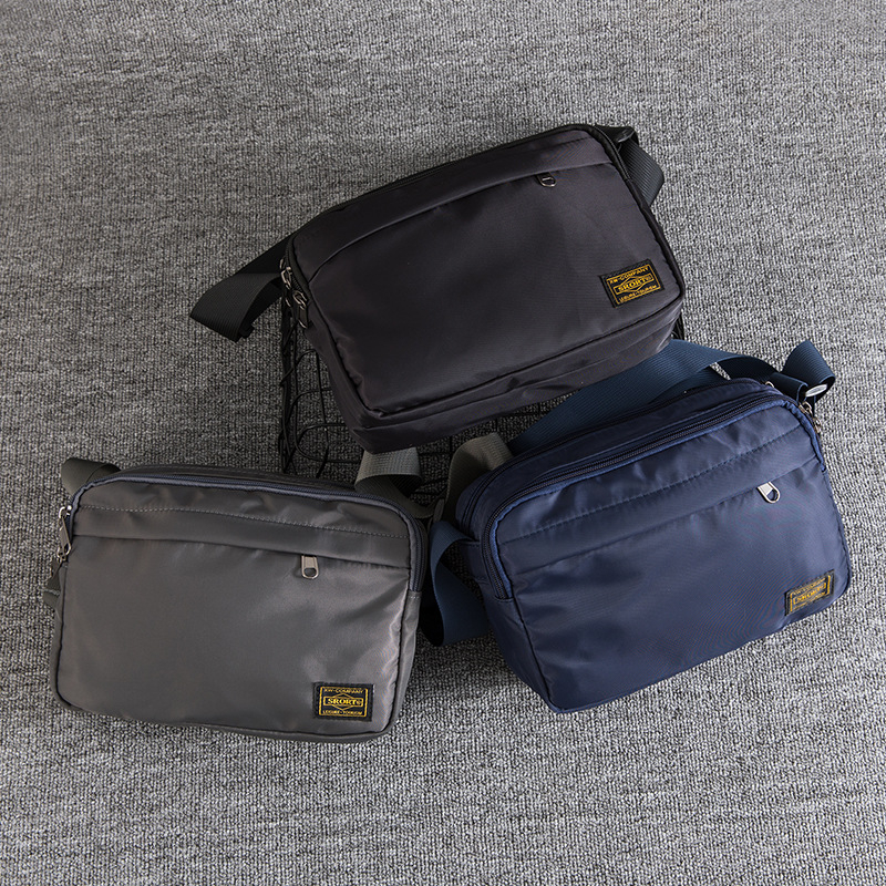Muška crossbody torba u ulicnom stilu, Oxford plat materijal, jednobojna podstava od poliestera, pogodna za slobodno vrijeme i putovanja, ljeto 2024 izdanje