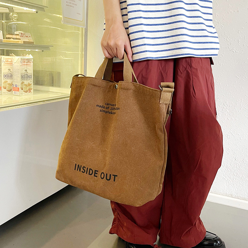 Muška platnena crossbody torba s proširenjem, tisk s slovima, platnena podstava, kod 107a, ljeto 2025