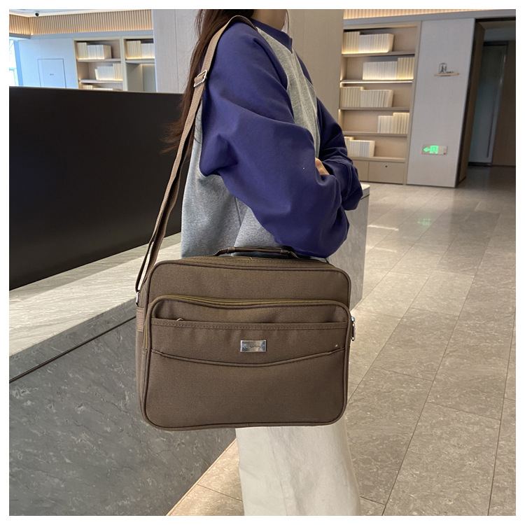 Muška platnena messenger torba, gradski stil, iznimno lagana, stane 12-inčni prijenosnik