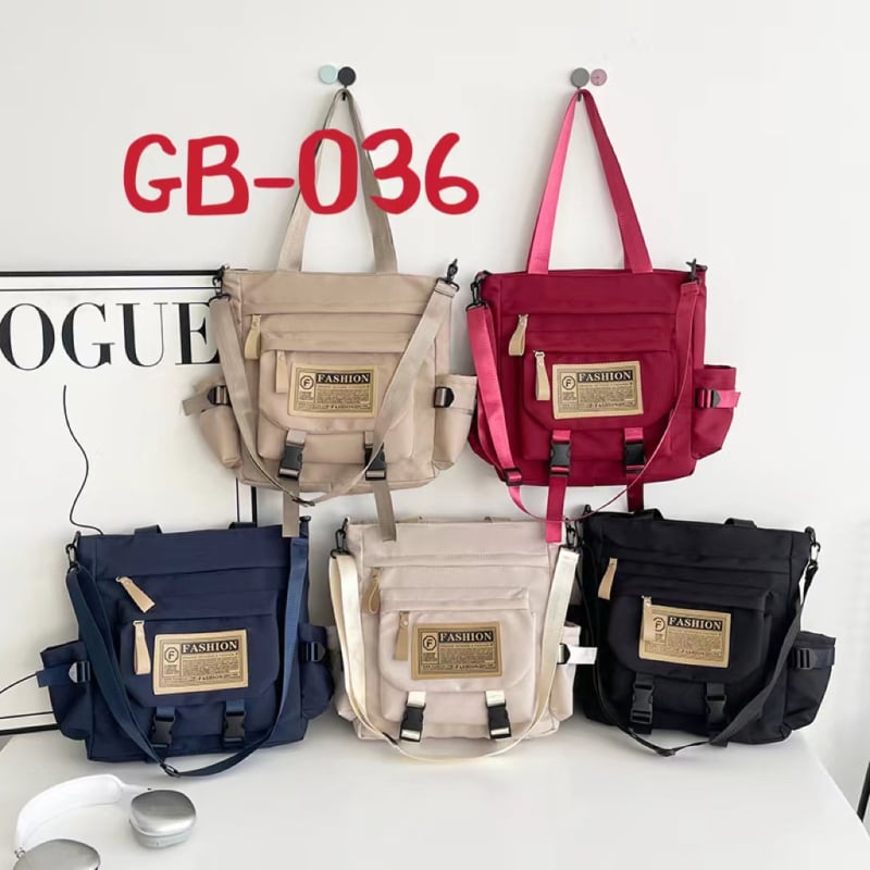 Messenger táska japán stílusú munkaruházat retro dizájnnal, mindennapi használatra; Anyag: Oxford vászon; Bélése: poliészter; Nyitás: cipzár; Forma: horizontális négyzet; Három vállpánt