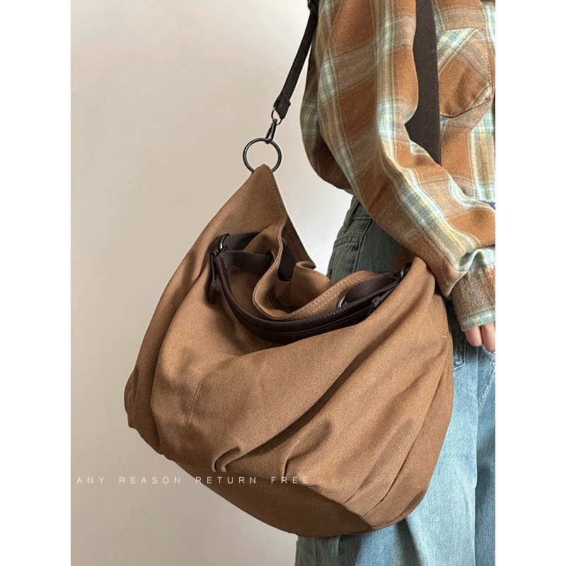 Muška platnena crossbody torba, velika kapaciteta, višefunkcionalna, jednobojni uzorak, proljeće 2024