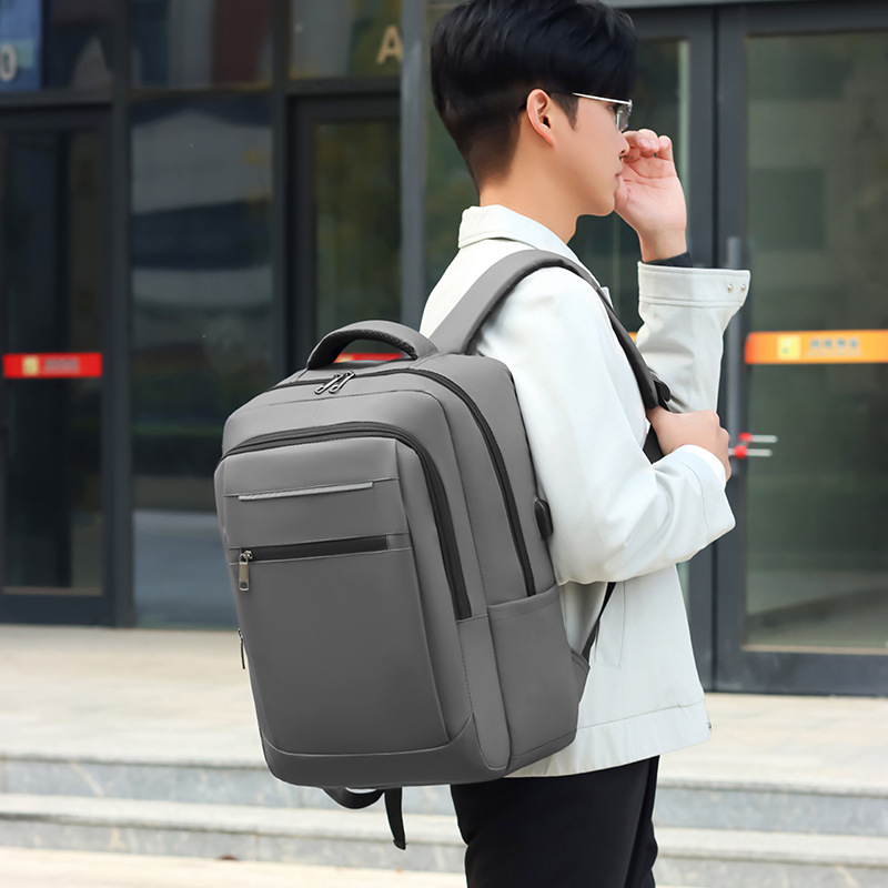 Unisex poslovni ruksak s zaštitom od krađe, vodootporan, Oxford tkanina, kapacitet 20–35L, ergonomski stražnji panel