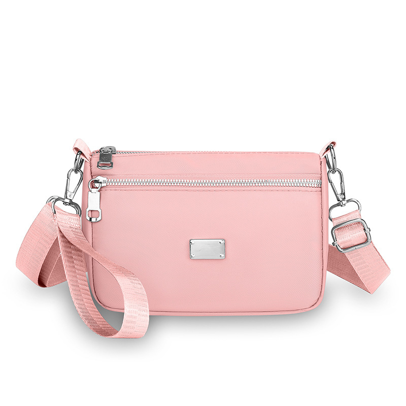 Nylon crossbody torba, gradski minimalistički stil, horizontalni kvadratni oblik, zatvarač, unutarnja džep s zatvaračem