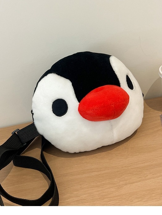 Crossbody torba od pliša, okruglog oblika, zatvarač na zip, pretinac za mobitel, podstava od poliester