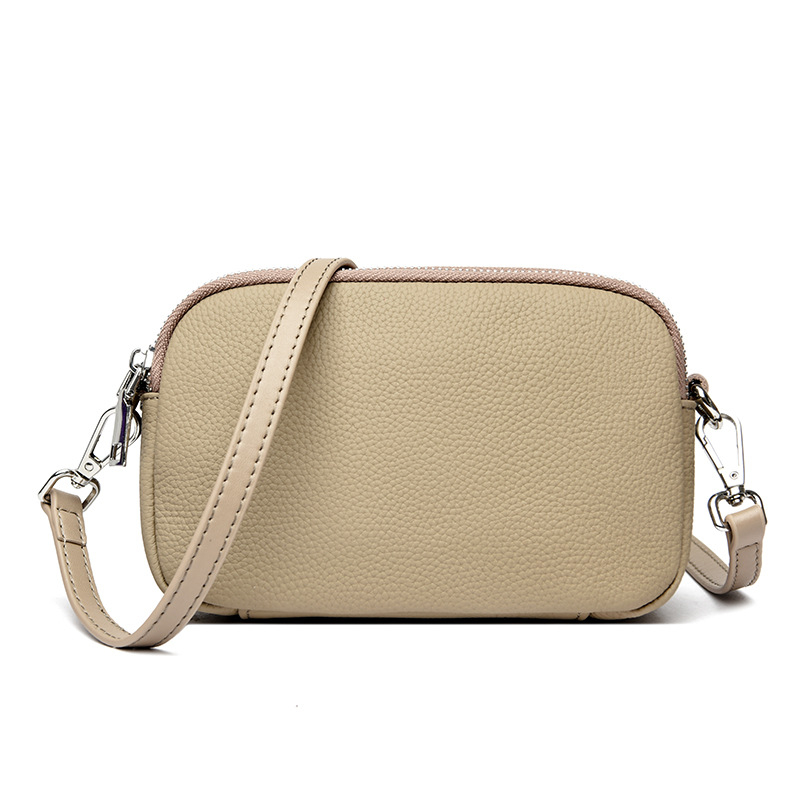 Ženska kožna crossbody torbica, mala kvadratna forma, zatvarač, džep za telefon i novčanik