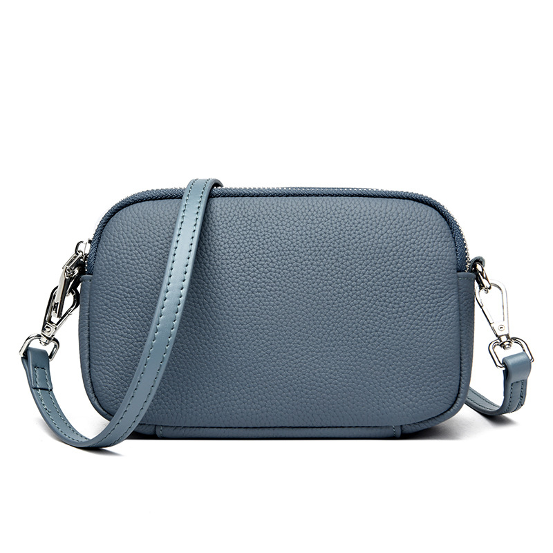 Ženska kožna crossbody torbica, mala kvadratna forma, zatvarač, džep za telefon i novčanik