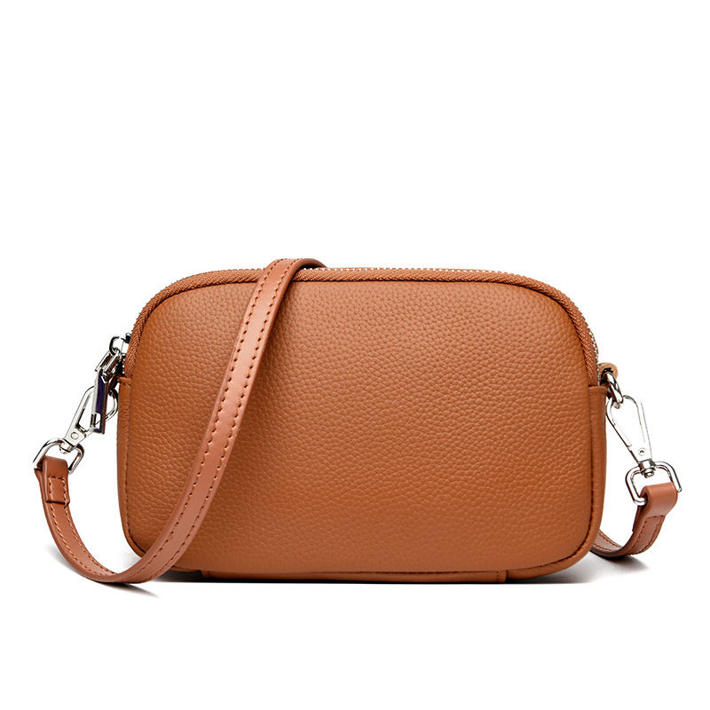 Ženska kožna crossbody torbica, mala kvadratna forma, zatvarač, džep za telefon i novčanik