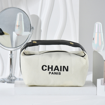 Kozmetička torbica s alfabetnim printom (materijal: platno; podstava: poliester; zatvarač: zip; karakteristike: prozračna, vodootporna, ultra lagana)