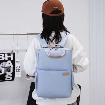 Unisex gradski ruksak, prozračni visokohustotni poliester, kapacitet 20–35L, zakrivljeni ramenski pojas