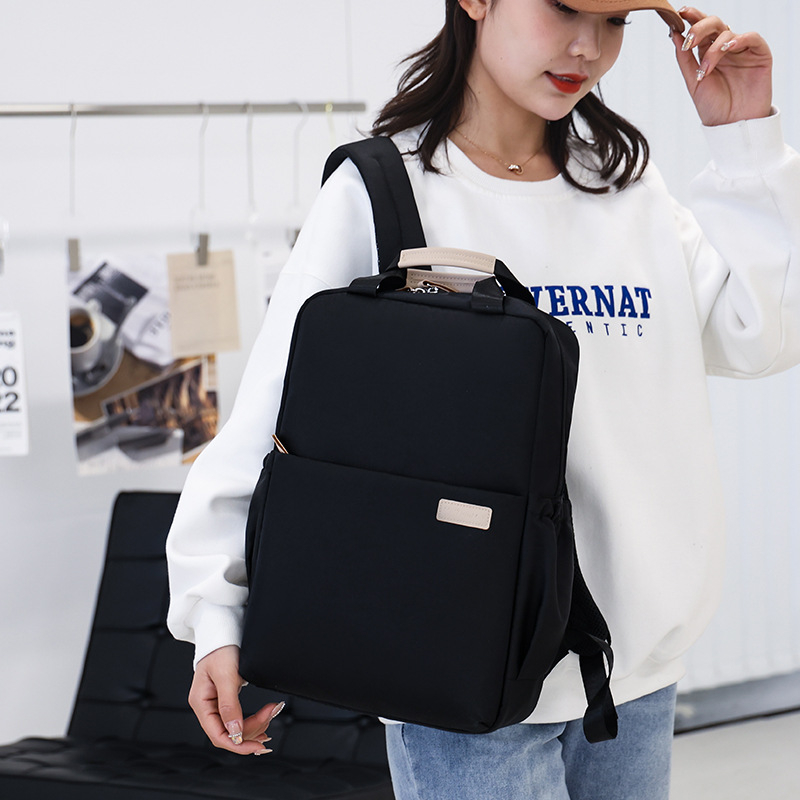 Unisex gradski ruksak, prozračni visokohustotni poliester, kapacitet 20–35L, zakrivljeni ramenski pojas