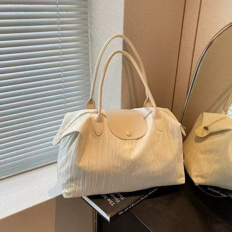 Putna torba za kratka putovanja - unisex, iznimno lagana i otporna, poliester, kapacitet ispod 20 L