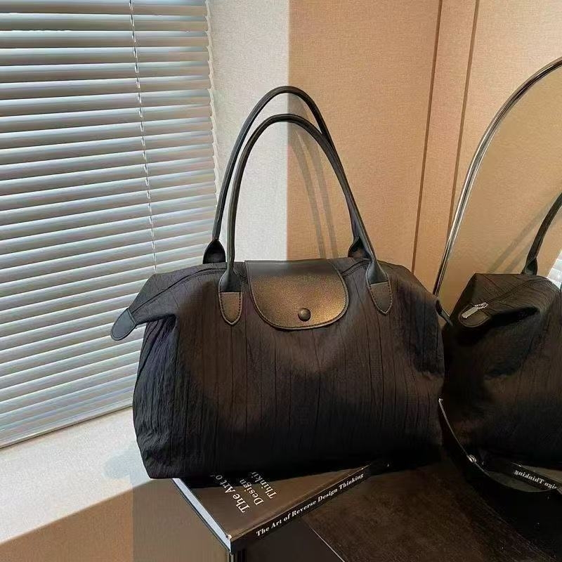 Putna torba za kratka putovanja - unisex, iznimno lagana i otporna, poliester, kapacitet ispod 20 L