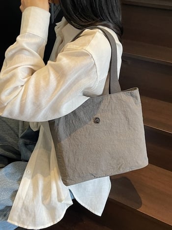 Torba od platna – gradski minimalistički stil, zatvarač, unutarnja pretinac za mobitel, poliesterska podstava, vodoravni kvadratni oblik