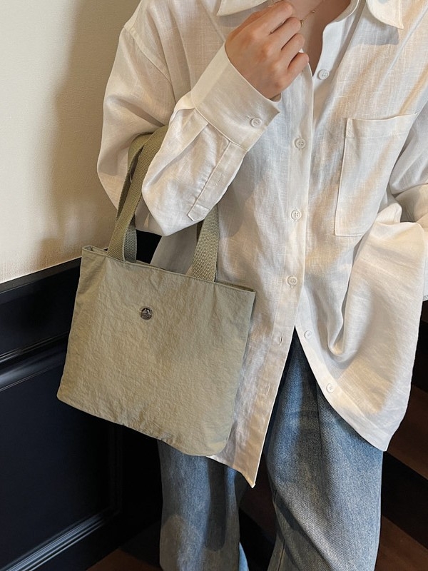 Torba od platna – gradski minimalistički stil, zatvarač, unutarnja pretinac za mobitel, poliesterska podstava, vodoravni kvadratni oblik