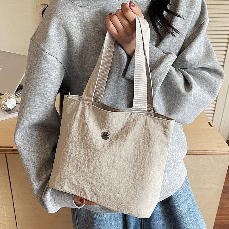 Torba od platna – gradski minimalistički stil, zatvarač, unutarnja pretinac za mobitel, poliesterska podstava, vodoravni kvadratni oblik