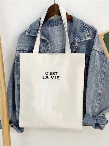 Ženska torba od platna, urbani minimalistički stil, vertikalnog kvadratnog oblika, otvoren vrh, džep za mobitel, bez podstavka