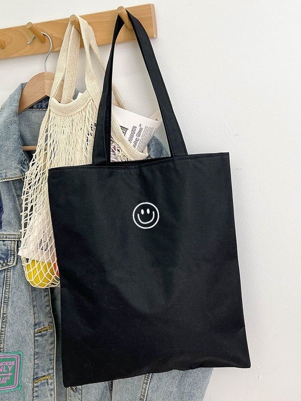 Ženska torba od platna, urbani minimalistički stil, vertikalnog kvadratnog oblika, otvoren vrh, džep za mobitel, bez podstavka