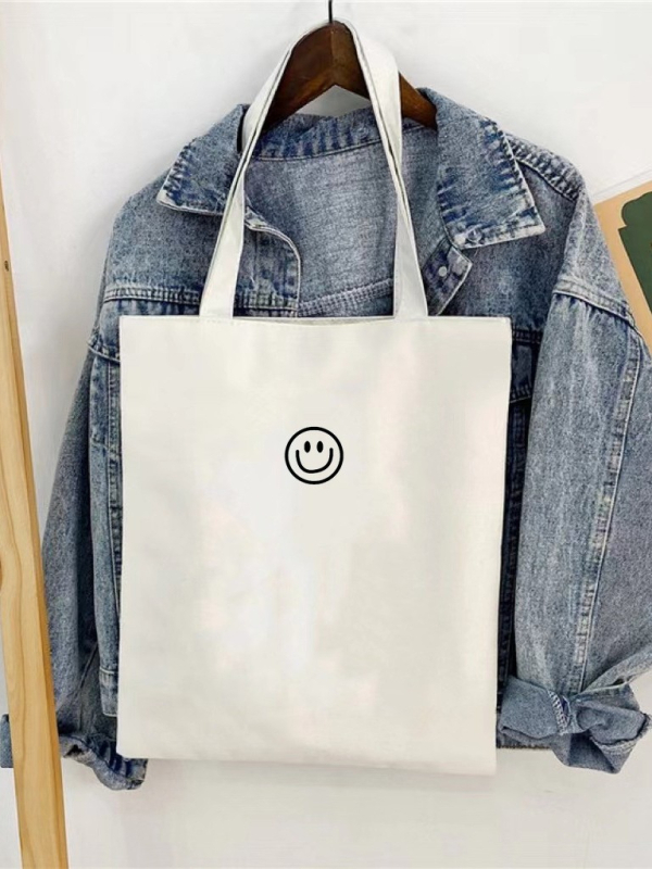 Ženska torba od platna, urbani minimalistički stil, vertikalnog kvadratnog oblika, otvoren vrh, džep za mobitel, bez podstavka