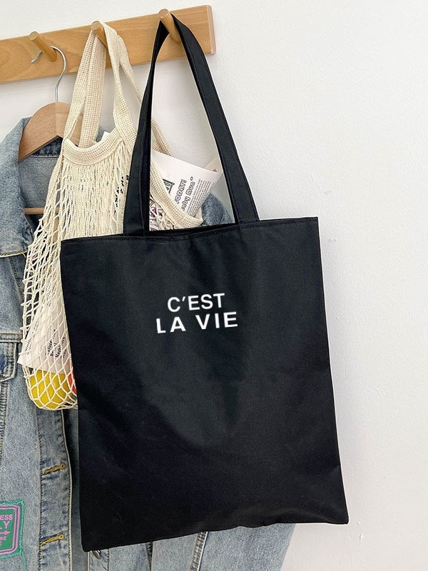 Ženska torba od platna, urbani minimalistički stil, vertikalnog kvadratnog oblika, otvoren vrh, džep za mobitel, bez podstavka