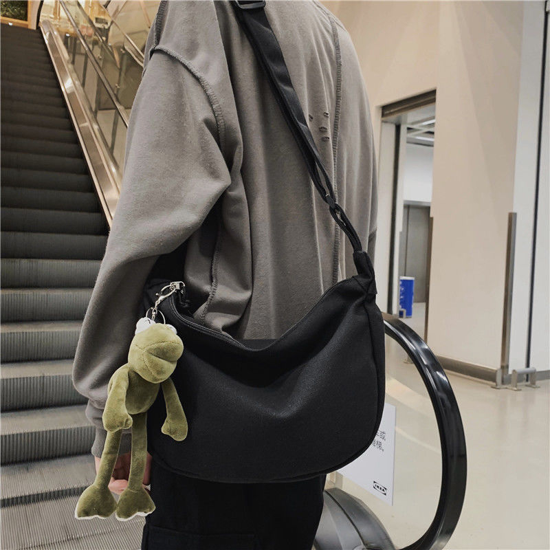 Platnena crossbody torba - dumpling-type oblik, zatvarač, bez podstave, gradski stil