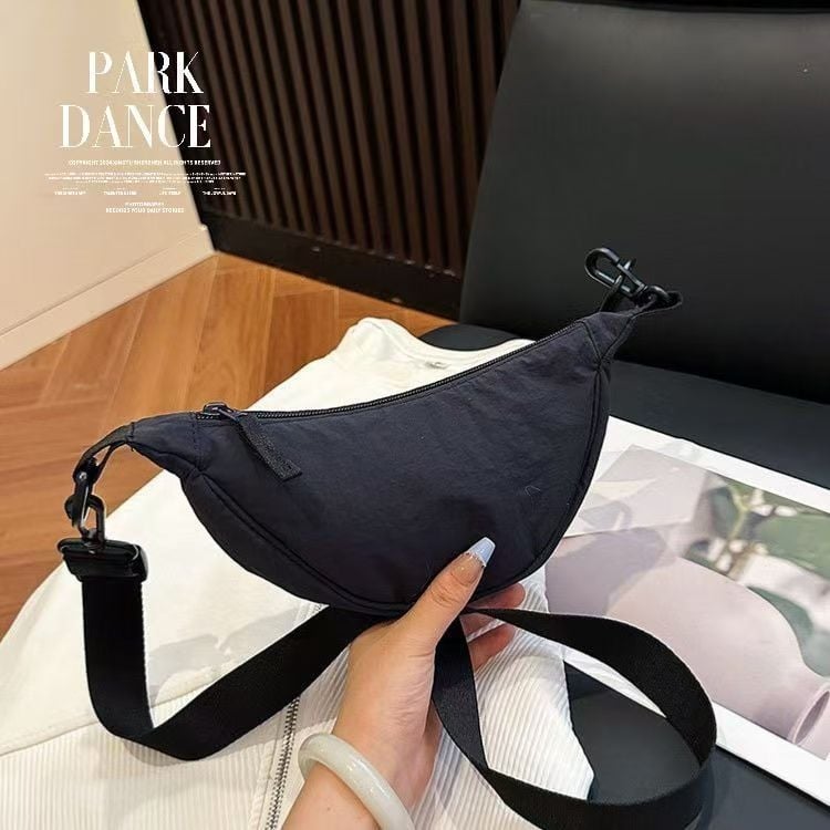 Dumpling táska leválasztható vállpánttal, vászon anyagból, cipzáras záródás, belső irattáska, városi egyszerű stílus