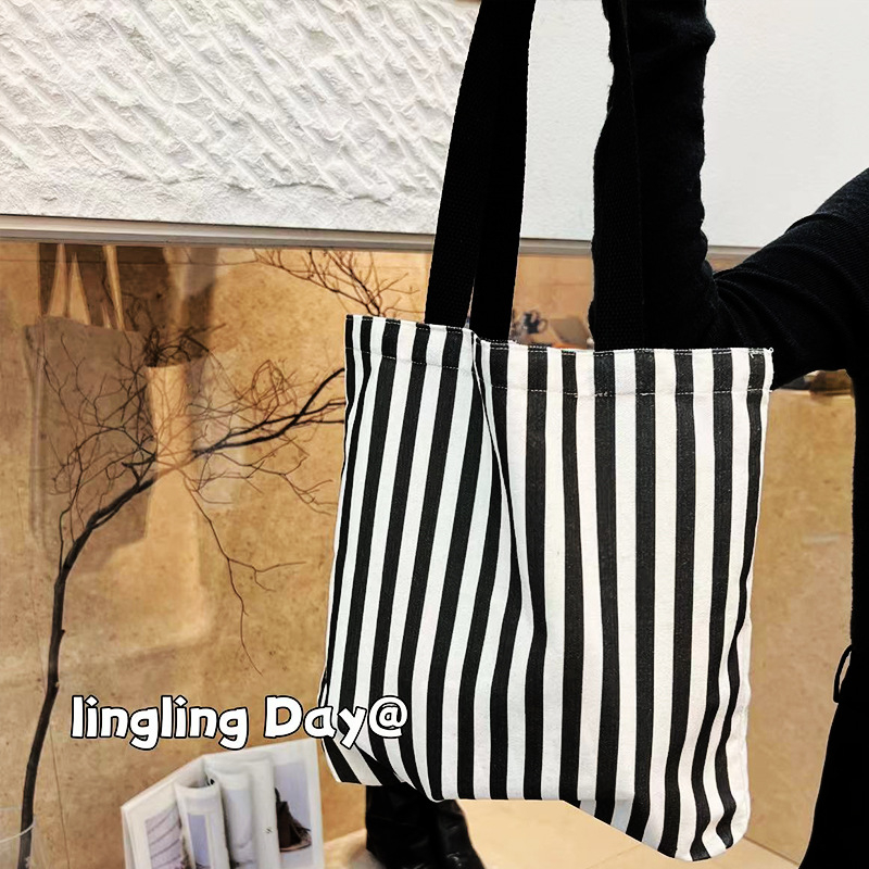 Crno-bijela tašna preko ramena s uzorkom houndstooth, od platna, velika kapaciteta, moderna i svestrana za žene