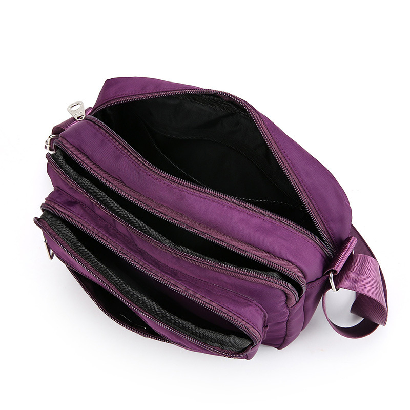 Ženska crossbody torba od Oxford platna, vodoravnog kvadratnog oblika, zatvaranje zipom, unutarnja džep na zip