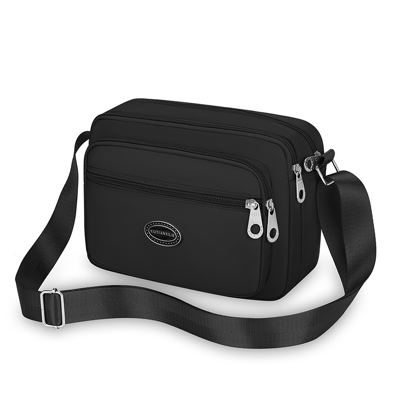 Ženska crossbody torba od Oxford platna, vodoravnog kvadratnog oblika, zatvaranje zipom, unutarnja džep na zip
