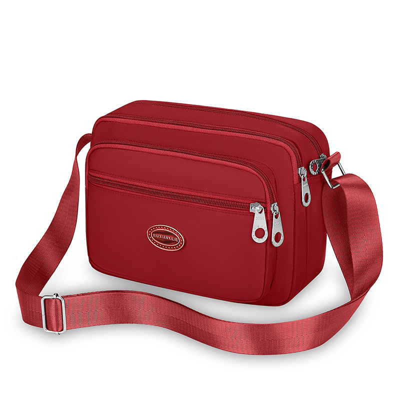 Ženska crossbody torba od Oxford platna, vodoravnog kvadratnog oblika, zatvaranje zipom, unutarnja džep na zip