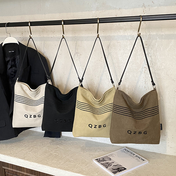 Zhan Lin canvas crossbody torba s poliesterskom podlogom, zatvaranje zip zatvaračem, unutarnji džepovi za telefon i dokumente