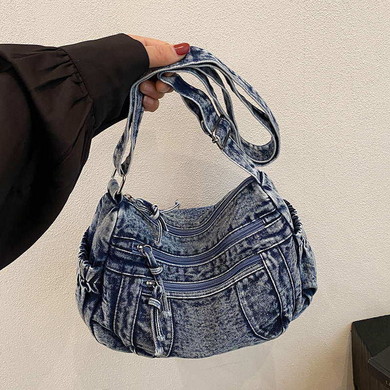 Denim crossbody torba s prednjim džepom, zatvaračem i unutarnjim džepom za telefon