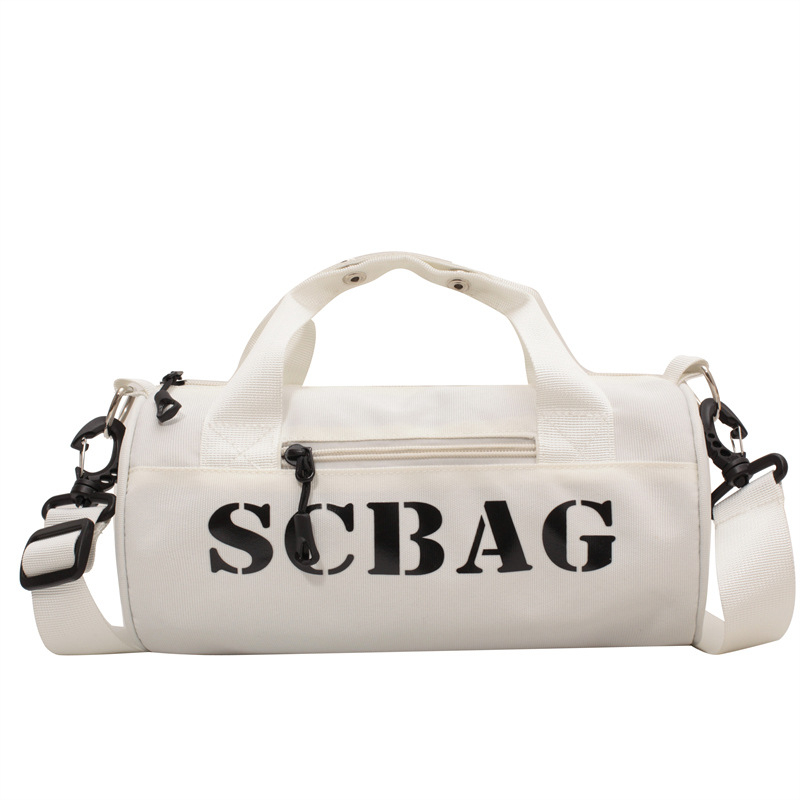 Geantă crossbody, stil japonez, nylon, design cilindric bucket, închidere cu fermoar, buzunar cu fermoar în interior și buzunar pentru telefon.