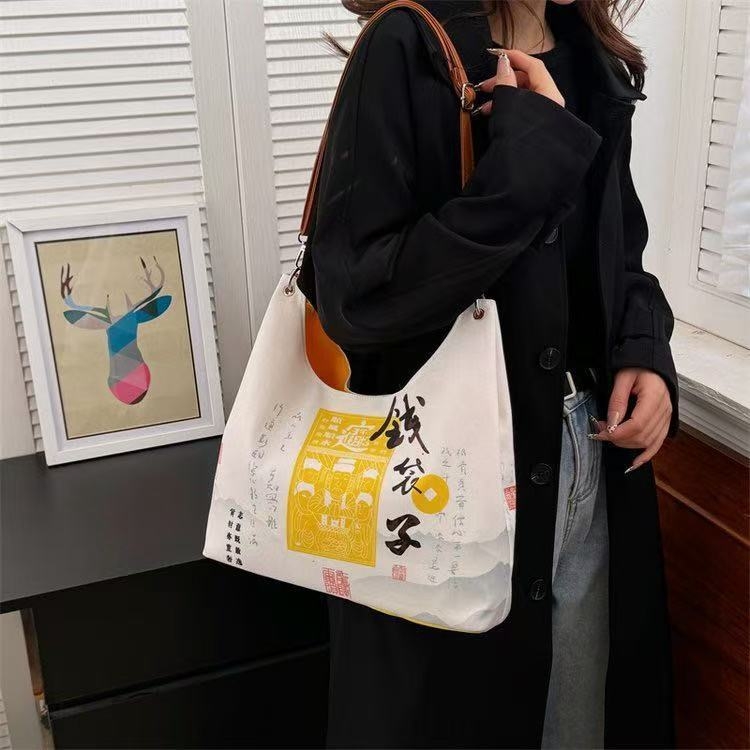 Geantă tip găleată din pânză, fermoar, căptușeală poliester, buzunar pentru telefon și curea de umăr