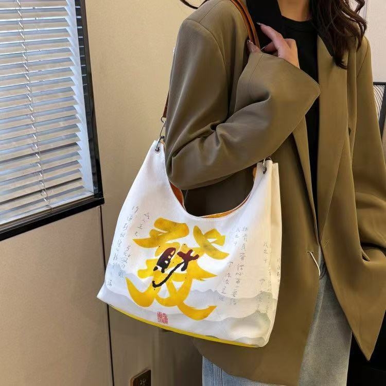 Geantă tip găleată din pânză, fermoar, căptușeală poliester, buzunar pentru telefon și curea de umăr