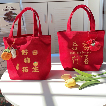 Ženska torbica — vertikalni kvadratni oblik, platnen materijal, književni nacionalni stil, otvoren vrh, mekana konstrukcija, svakodnevna uporaba