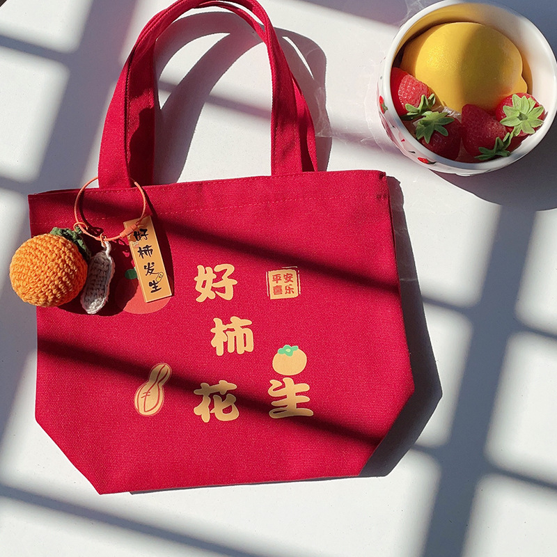 Ženska torbica — vertikalni kvadratni oblik, platnen materijal, književni nacionalni stil, otvoren vrh, mekana konstrukcija, svakodnevna uporaba