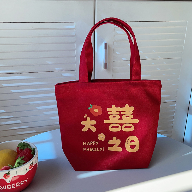 Ženska torbica — vertikalni kvadratni oblik, platnen materijal, književni nacionalni stil, otvoren vrh, mekana konstrukcija, svakodnevna uporaba