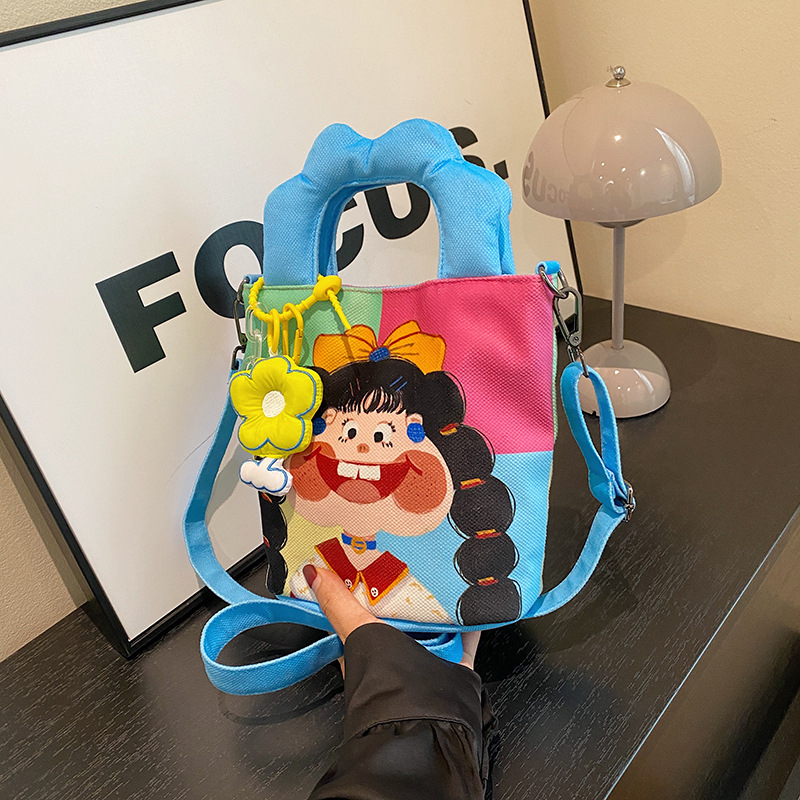Platnena torba tipa kanta s karikaturnim motivom, preko ramena i crossbody, za svakodnevnu upotrebu