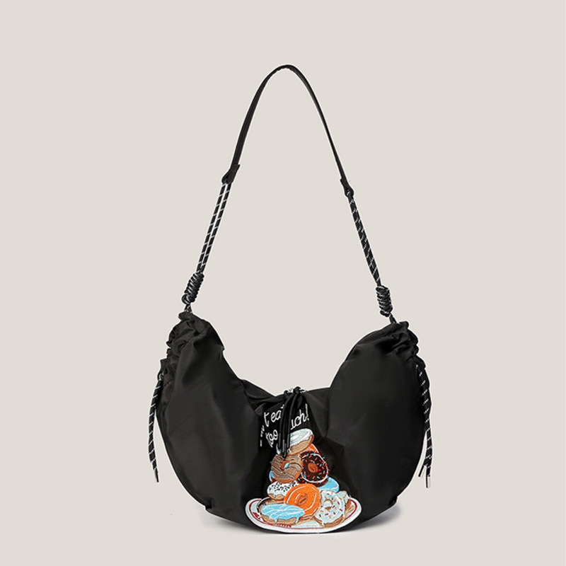 Nylon dumpling torba s crossbody remenom, ulični stil, otvaranje šnalom, unutarnja pretinica za telefon